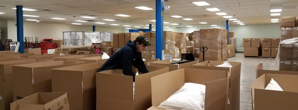 Movers Packing Boxes