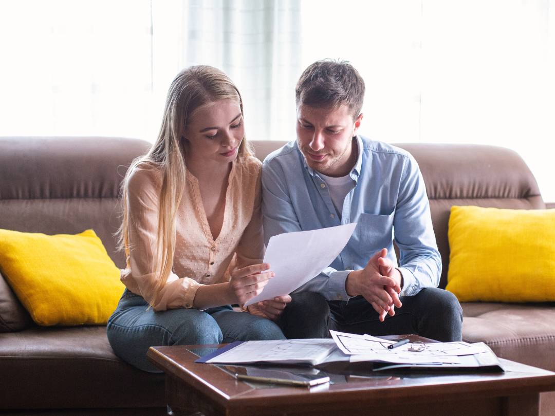 couple checking the average cost to move across country