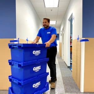 worker pushing the boxes out