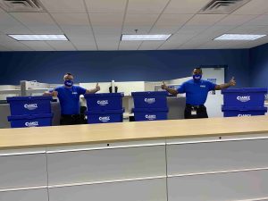 men working on moving commercial stuff