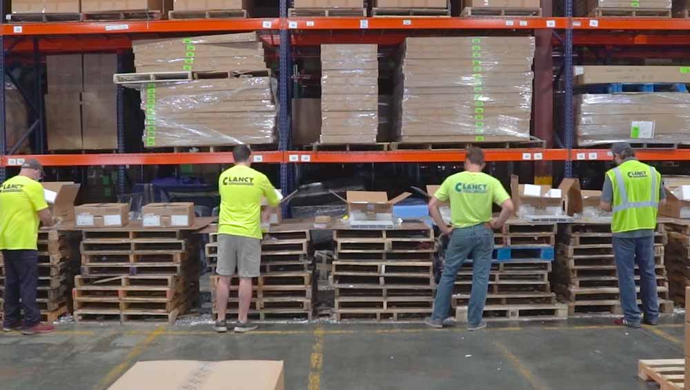 Warehouse personnel organizing items