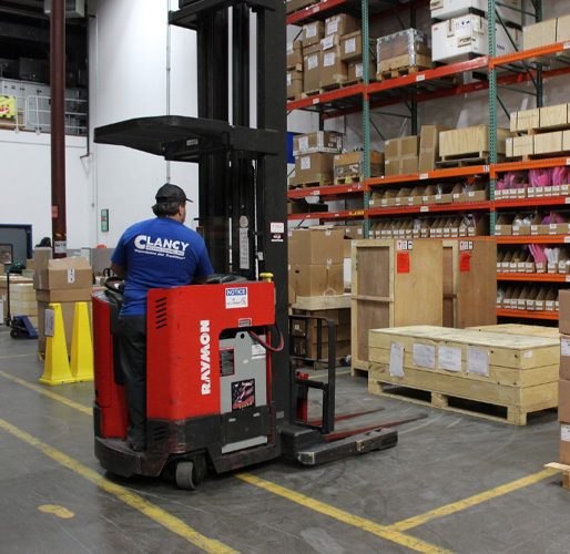 man using forklift to transfer package